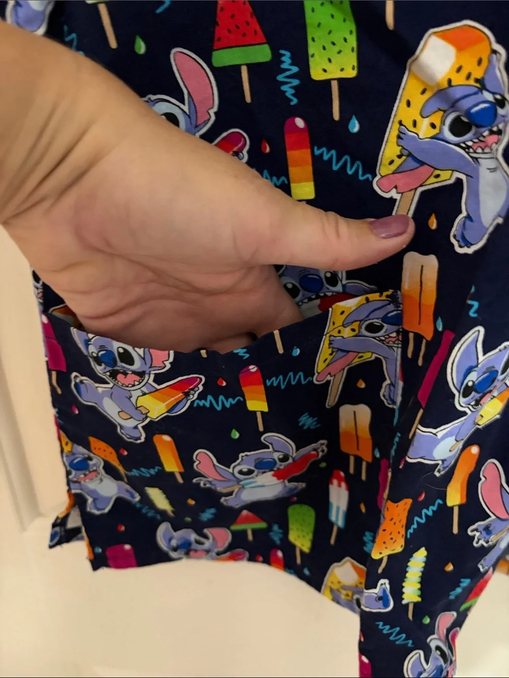 Disney Navy Blue Stitch Popsicle Print Scrub Top